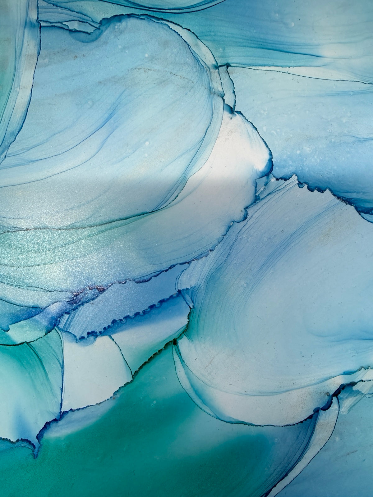Abstract art with swirling blue and white patterns